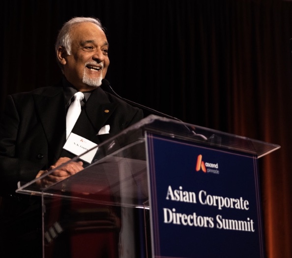 S. K. Gupta speaking at the Asian Corporate Directors Summit podium for Ascend Pinnacle